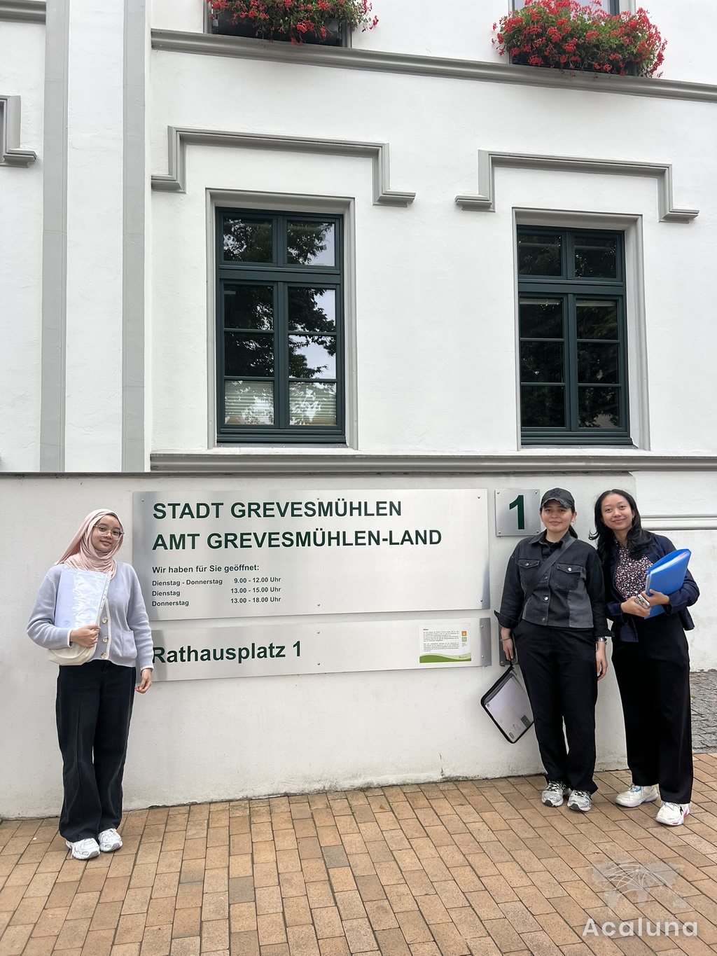 Apprentices registering at a local German registration office