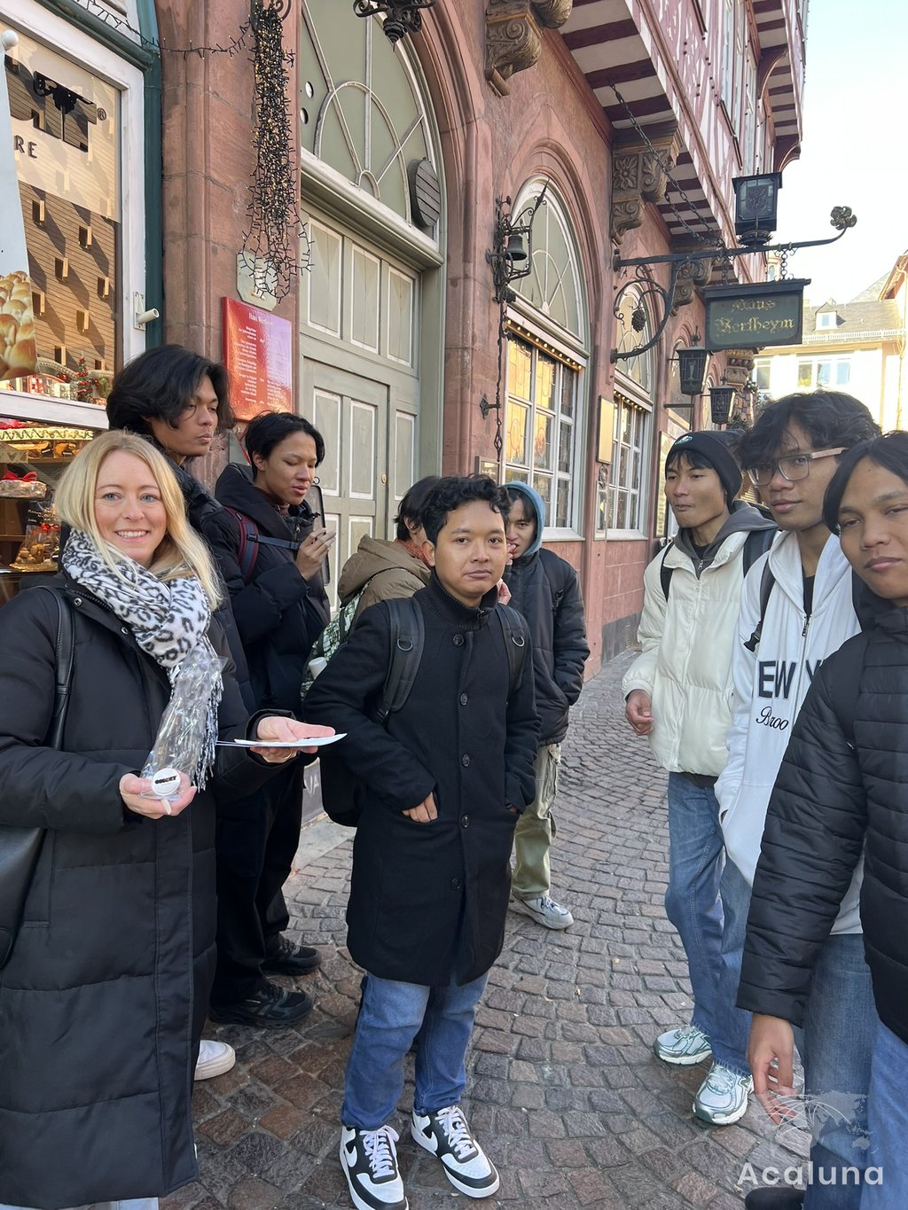 Jessica Moll with apprentices from Indonesia in an old town